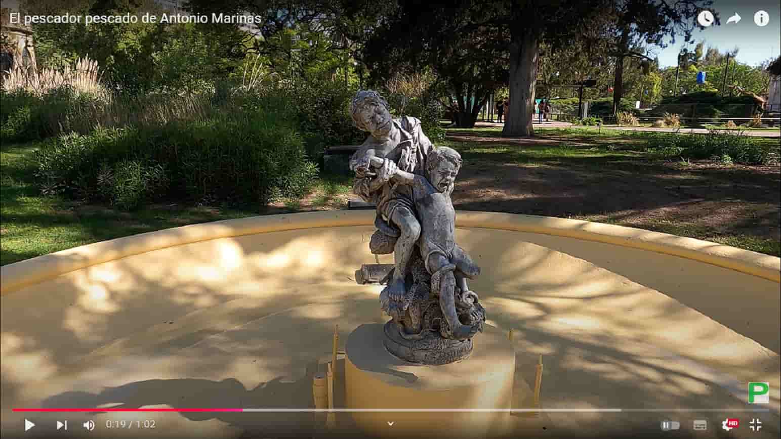 a statue of a man carrying a man